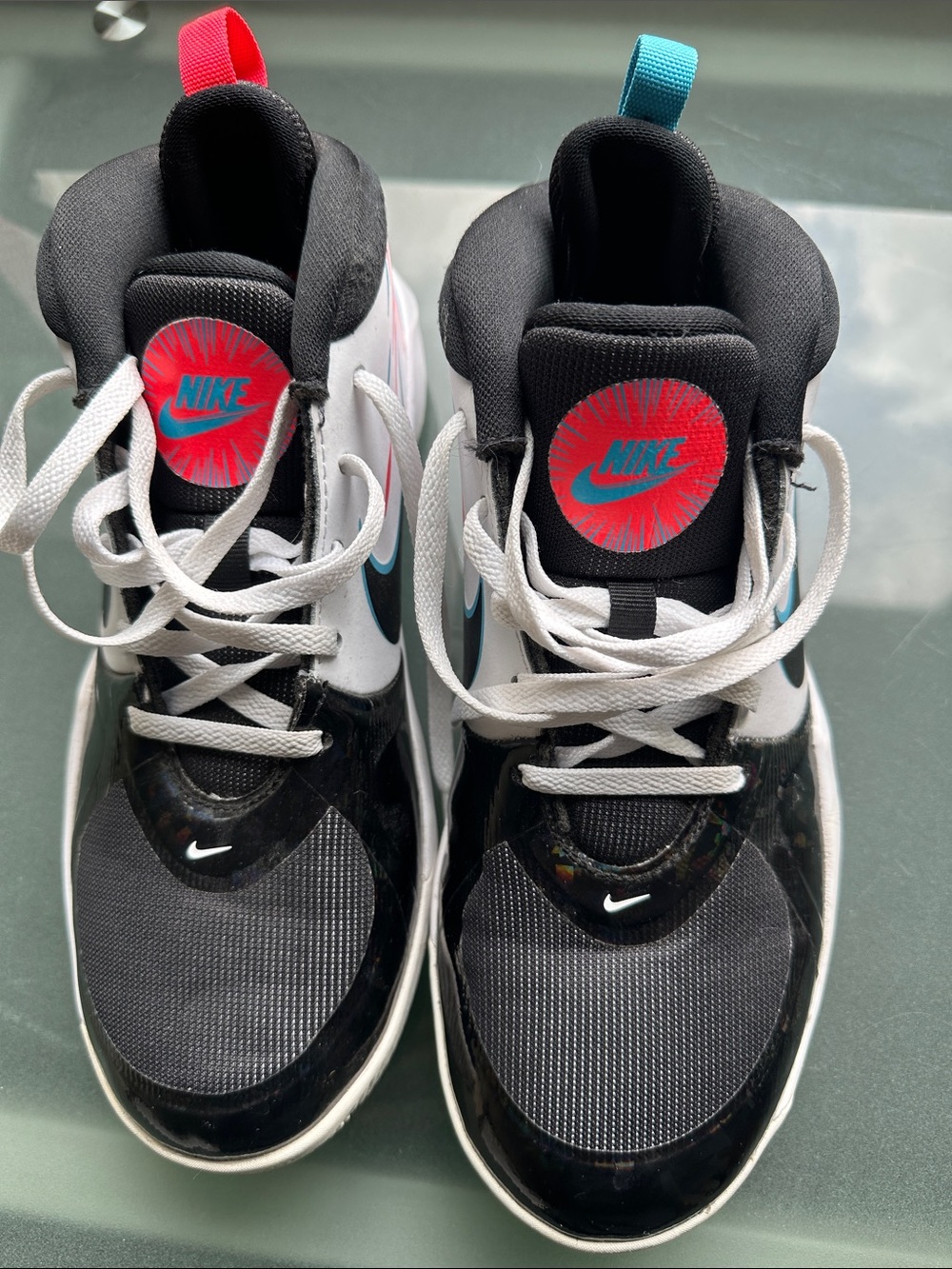Nike Kids Black and White High-Top Sneakers with Teal and Pink Details